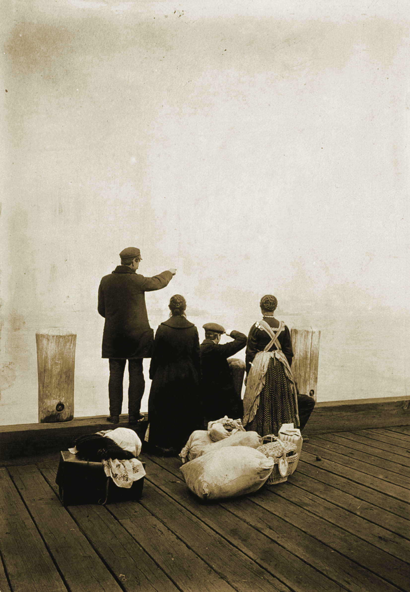 Four immigrants on Ellis Island